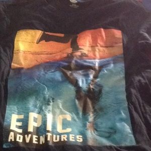 Black shirt with a skater on it